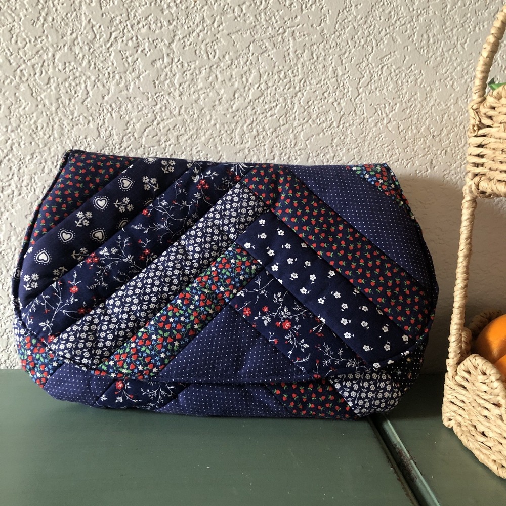 Susie's Bags Minnesota Burnsville paisley quilted clutch